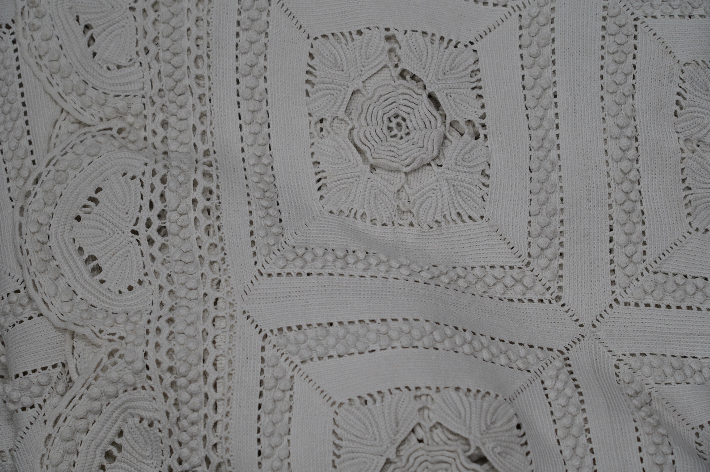 A 19th century French Provincial crochet bed cover. Condition - fair to good